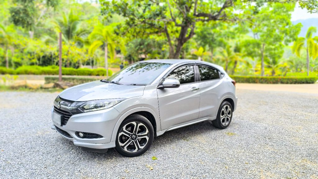 Car for Rent in koh Lanta a Customer enjoying scenic drive with rental car on Koh Lanta coastal road
